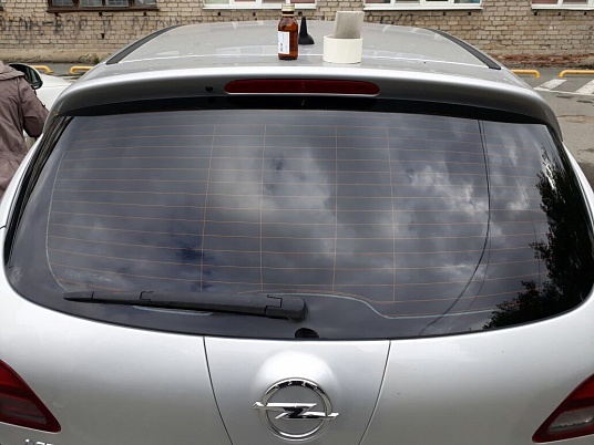 Текстовая реклама на заднее стекло