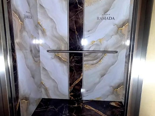 Брендирование лифта.Наклейки в лифт